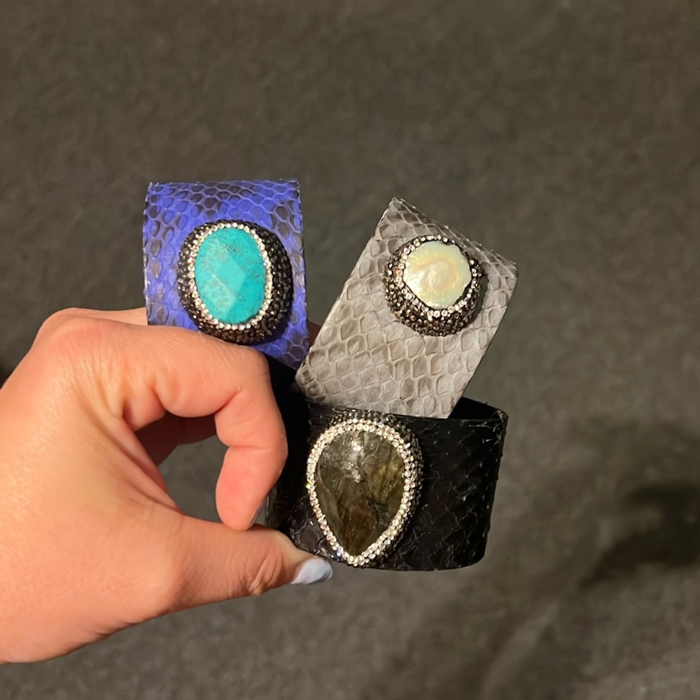Real leather, genuine stone cuff. The price is for all 3 cuffs
